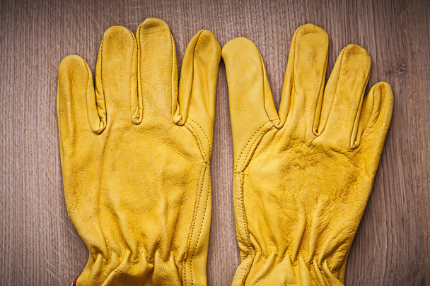 Leather yellow protective gloves  - Фото, зображення