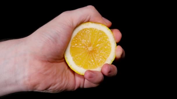 Mans Hand Squeezing Lemon - Footage, Video