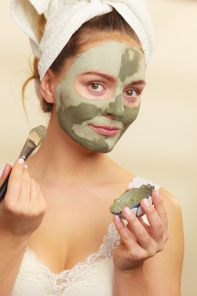 Woman applying  mask  - Foto, Imagem