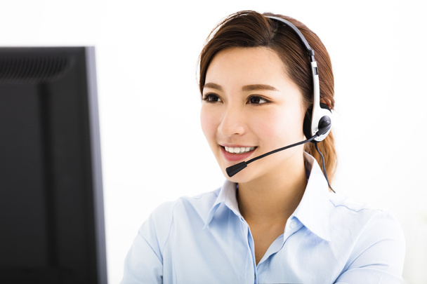 Smiling agent business woman with headsets - Photo, Image
