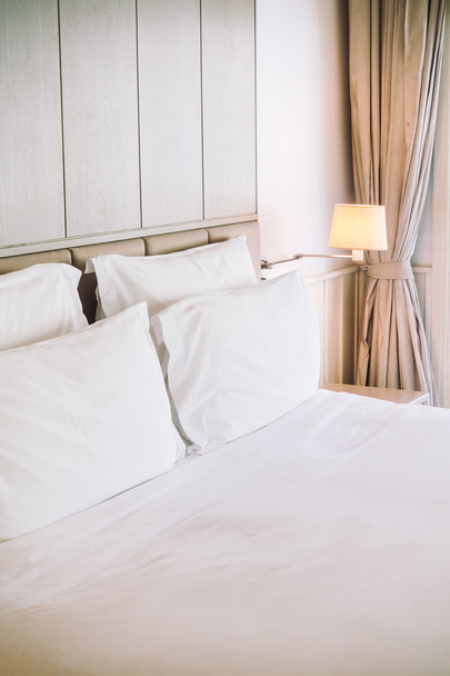 Beautiful luxury pillows on bed - Foto, afbeelding