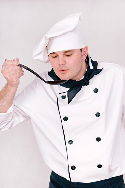 Chef com colher grande
 - Foto, Imagem