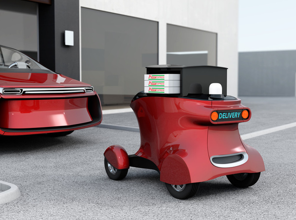 Robot de entrega autónomo frente al garaje esperando a recoger pizza
 - Foto, imagen