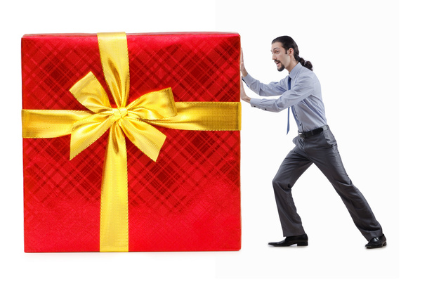 Businessman with gift boxes on white - Foto, Imagem