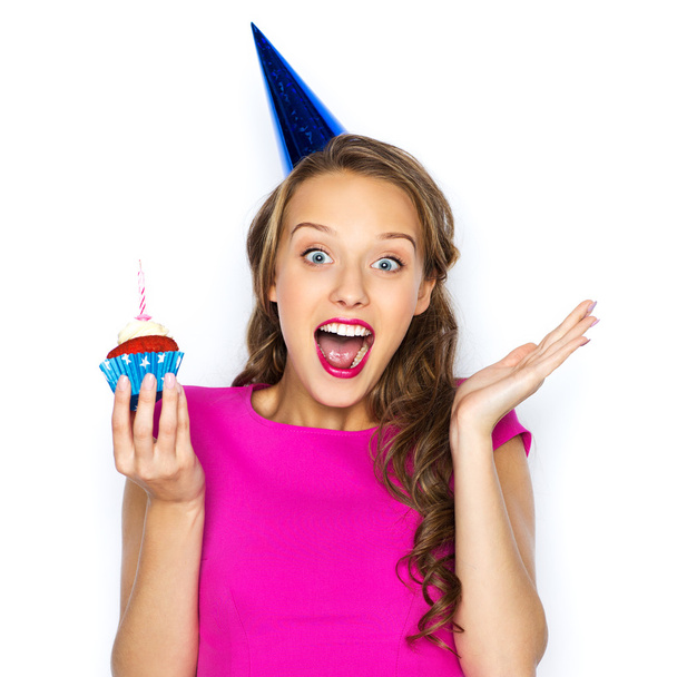happy woman or teen girl with birthday cupcake - Valokuva, kuva