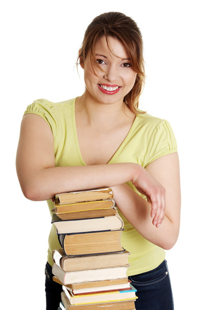 Young caucasian woman (student) with books - Fotoğraf, Görsel