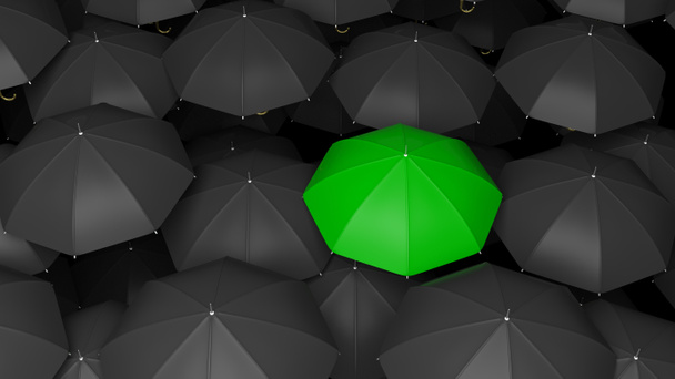 Representación 3D de grandes paraguas negros clásicos con un verde que sobresale
. - Foto, imagen