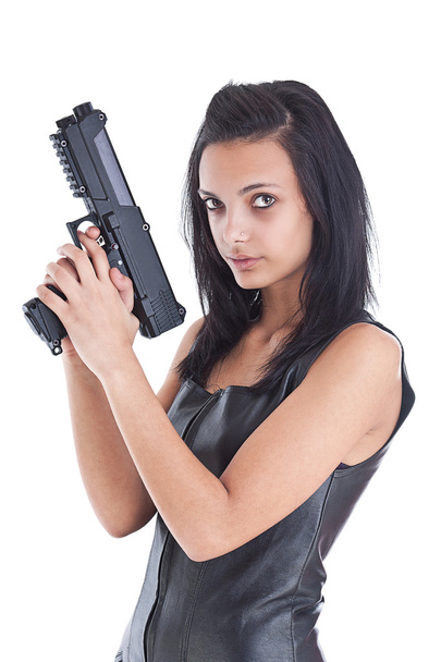 Woman is aiming a handgun - Foto, imagen