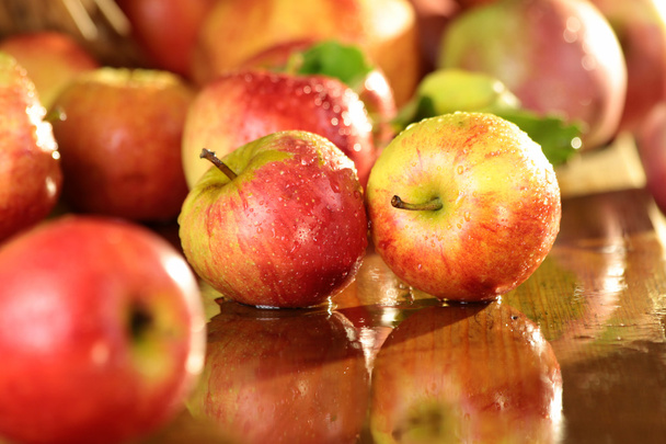Apples on a wet table - Фото, зображення