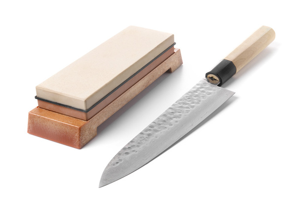 Trditional japanese kitchen knife and water stone. Isolated on w - Zdjęcie, obraz