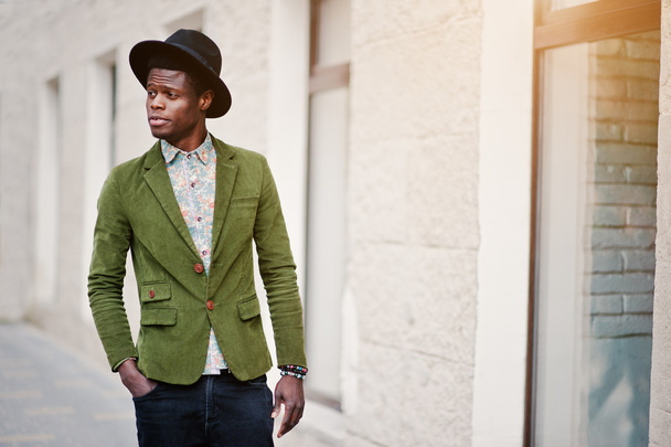 Close up fashion portrait of black african american man on green - Fotografie, Obrázek