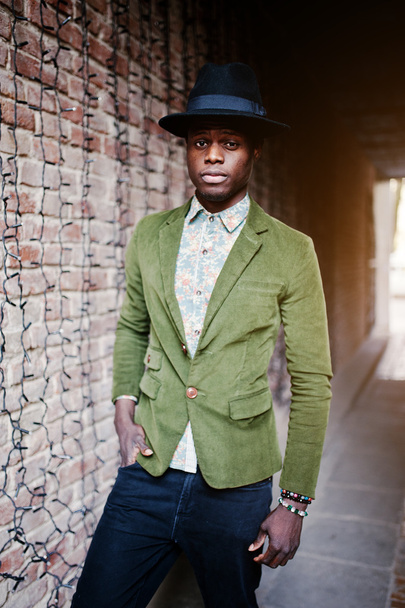 Fashion portrait of black african american man on green velvet j - Φωτογραφία, εικόνα