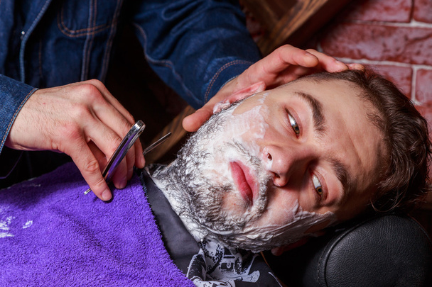 Shaving with a straight razor - Photo, Image