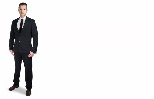 pohledný muž, samostatný, na sobě černý oblek  - Fotografie, Obrázek