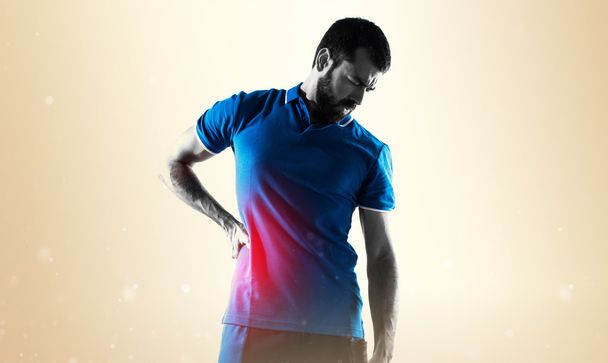 Tennis player with back pain - Zdjęcie, obraz