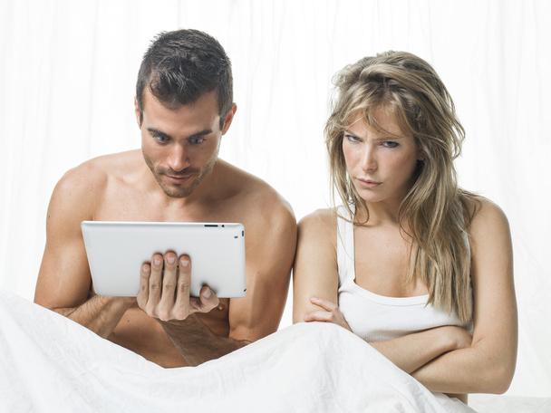 uncommunicative couple on bed in white - Photo, image