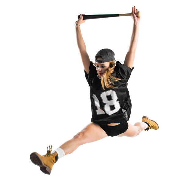 Женщина прыгает и играет в бейсбол
 - Фото, изображение