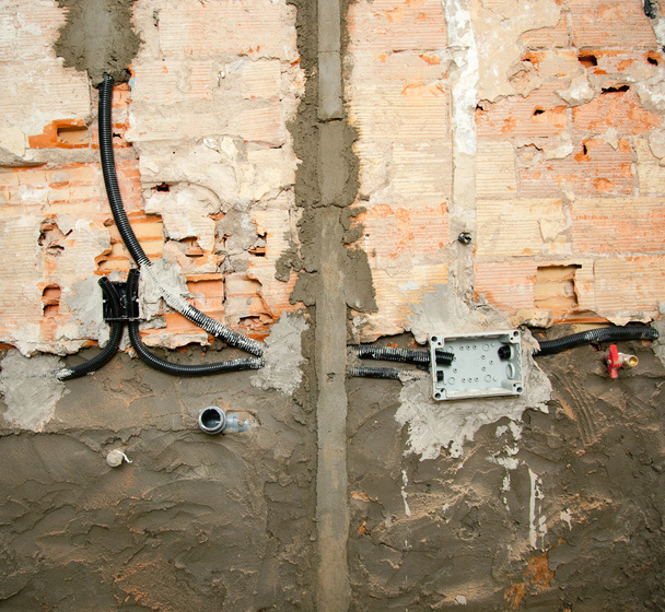 Electrical and plumbing installation in kitchen work - Fotó, kép