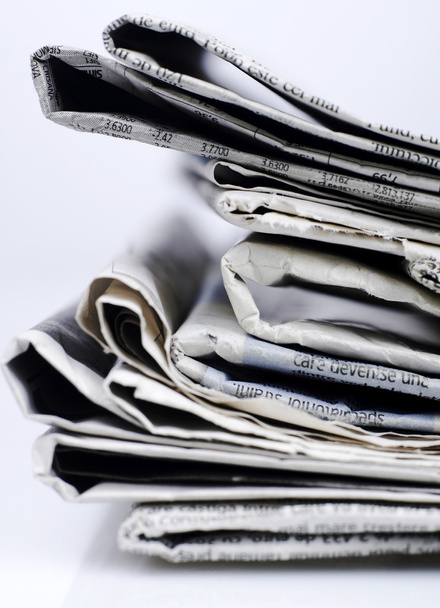 Газеты складывают крупным планом
 - Фото, изображение