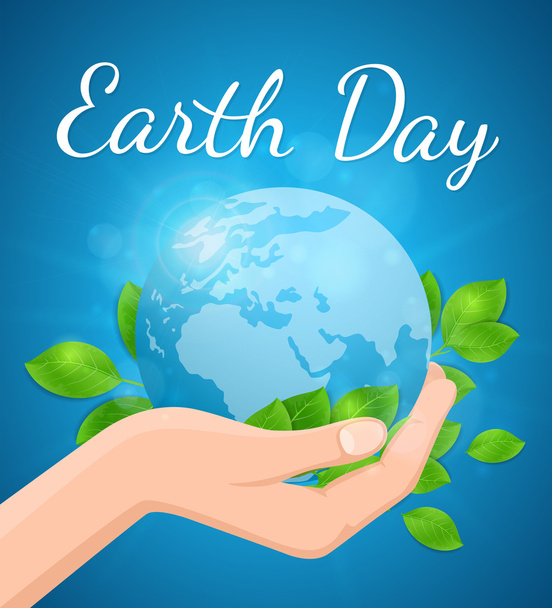 Planet Earth and green leaves in hand - Vector, imagen