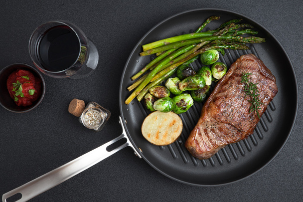 close up view on nice fresh steak on color background - Photo, Image