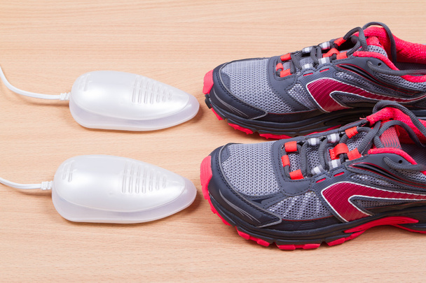 Elektrische ultraviolet schoen droger en Sneakers. - Foto, afbeelding