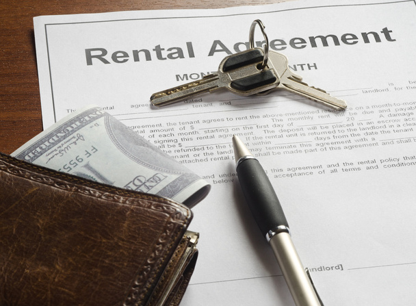 The rental agreement with money and pen - Photo, Image