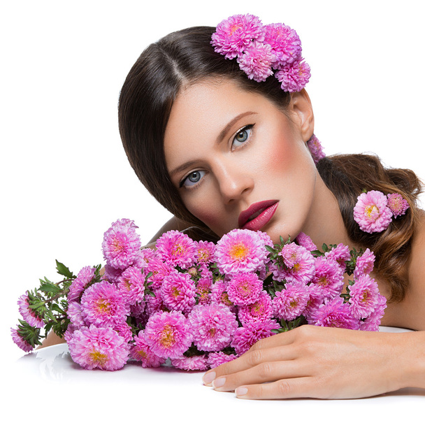 Beautiful girl with flowers - Photo, Image