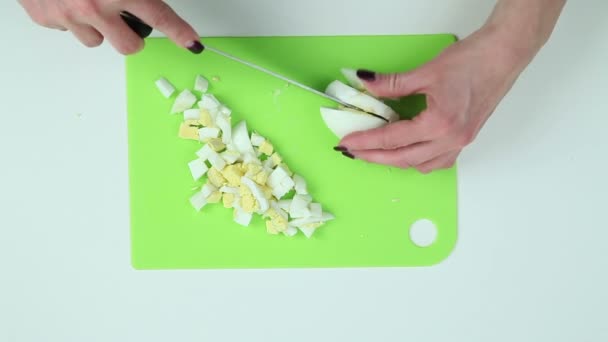 Eggs cut into pieces - Footage, Video