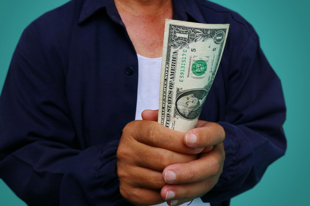 Üzletember ad pénzt, Egyesült Államok dollár (USD) számlák - készpénz - Fotó, kép