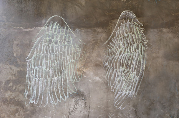 kreslit křídou úhel křídla na zdi, pouliční umění - Fotografie, Obrázek