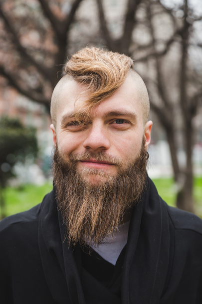 Stylish bearded man posing in the street - Фото, изображение