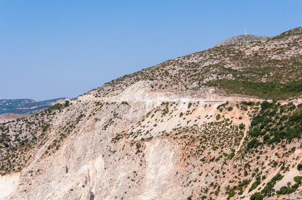Road on the cliff to Assos village, Kefalonia Island - Photo, Image