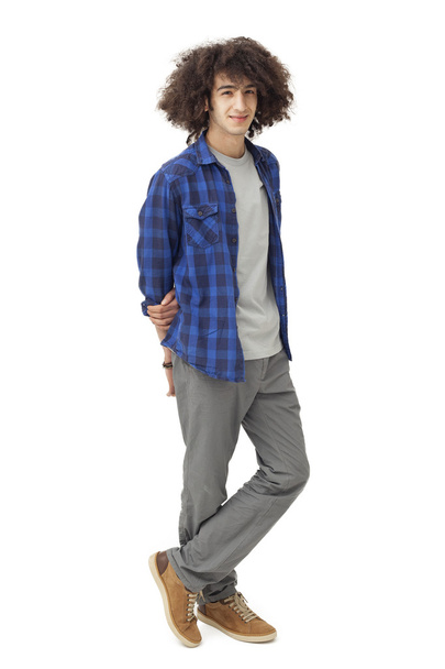 Standing young man on isolated background - Photo, Image
