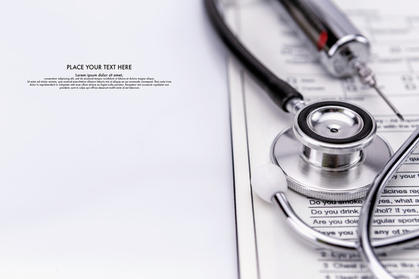 Stethoscope And syringe, test medical examination - Photo, Image