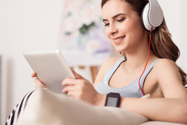 Positive girl listening to music - Photo, Image