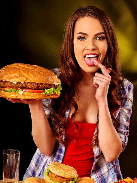 Girl eating big tasty sandwich. - Photo, Image