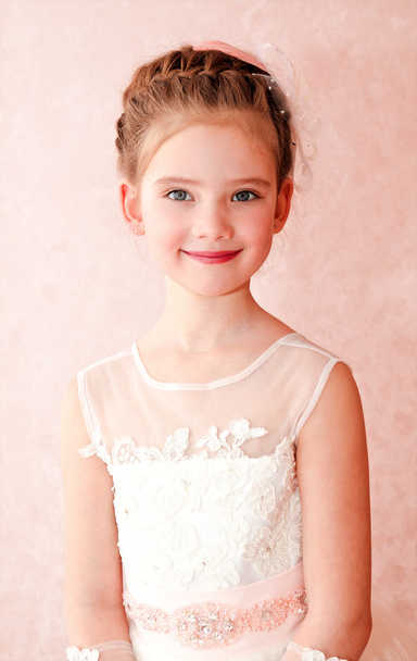 Adorable smiling little girl in white princess dress  - Fotoğraf, Görsel