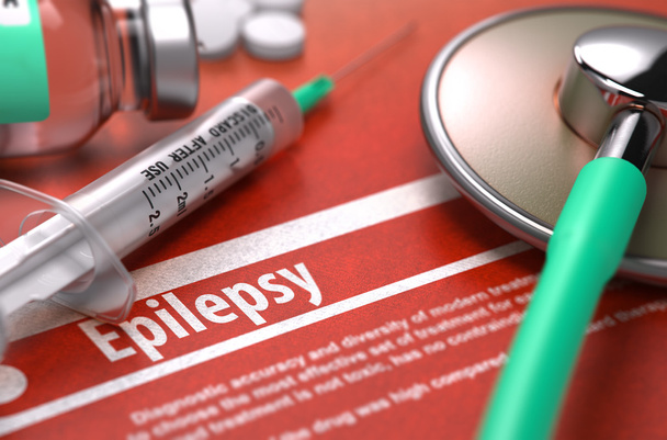 Epilepsie-gedrukte diagnose op oranje achtergrond. - Foto, afbeelding