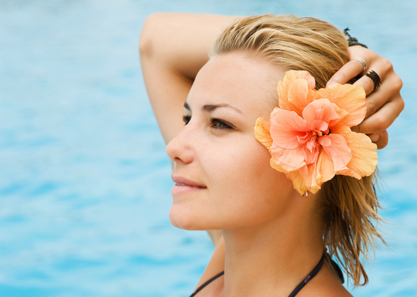Beautiful Young Woman At A Pool. Vacation Concept - Foto, Imagen
