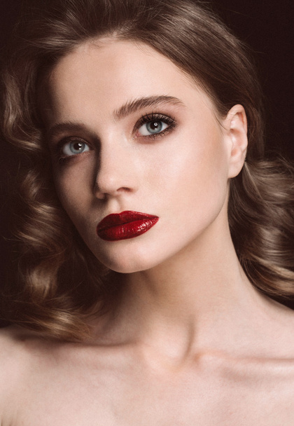 Beautiful woman face close up studio with red lips and curl hair - Φωτογραφία, εικόνα