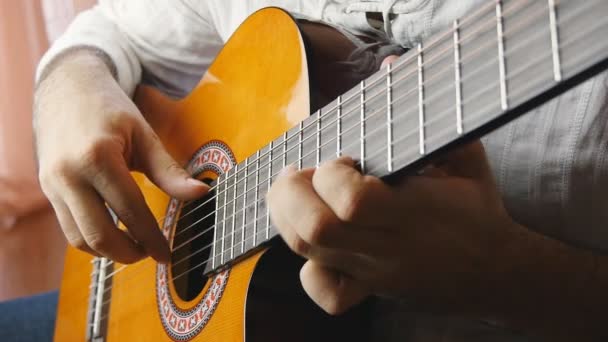 Hands playing on acoustic guitar in slow motion - Footage, Video