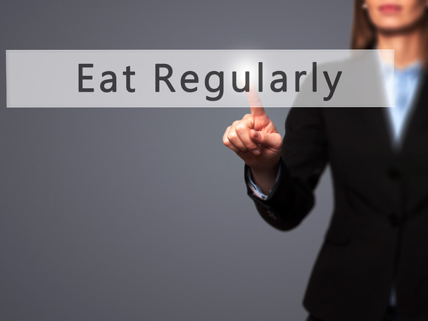 Їжте регулярно - натискання кнопки комерційної жінки на сенсорному гвинті
 - Фото, зображення