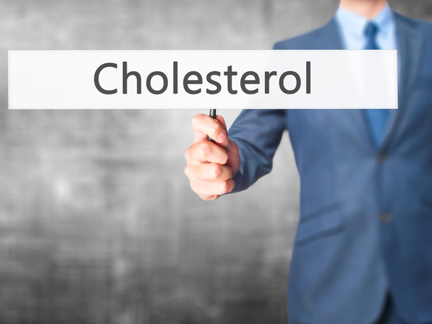 Cholesterol - podnikatel ruka drží znak - Fotografie, Obrázek