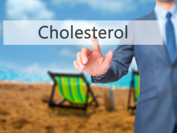 Kolesteroli - Liikemies käsi painamalla painiketta kosketusnäytöllä i
 - Valokuva, kuva