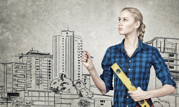 Woman engineer draw construction model - Foto, Imagen