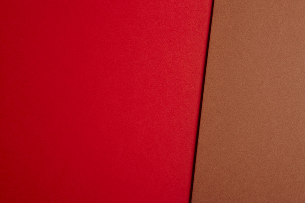Colored cardboards background in red brown tone. Copy space - Fotografie, Obrázek