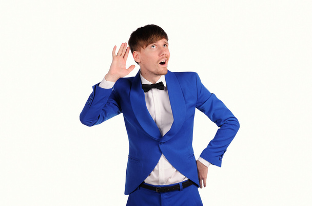 legrační muž v modrém suite s na bílém pozadí - Fotografie, Obrázek