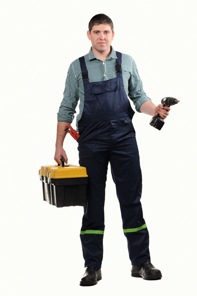 Mechanic with tools isolated on the white background - Φωτογραφία, εικόνα