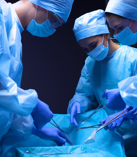 Team surgeon at work in operating room. - Φωτογραφία, εικόνα